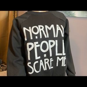 Normal people scare me long sleeve black sweater